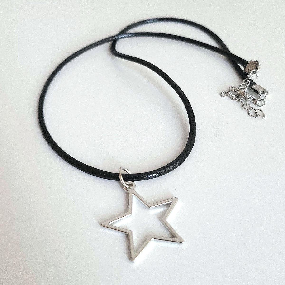 16" Silver Hollow Star Necklace - Black Cord