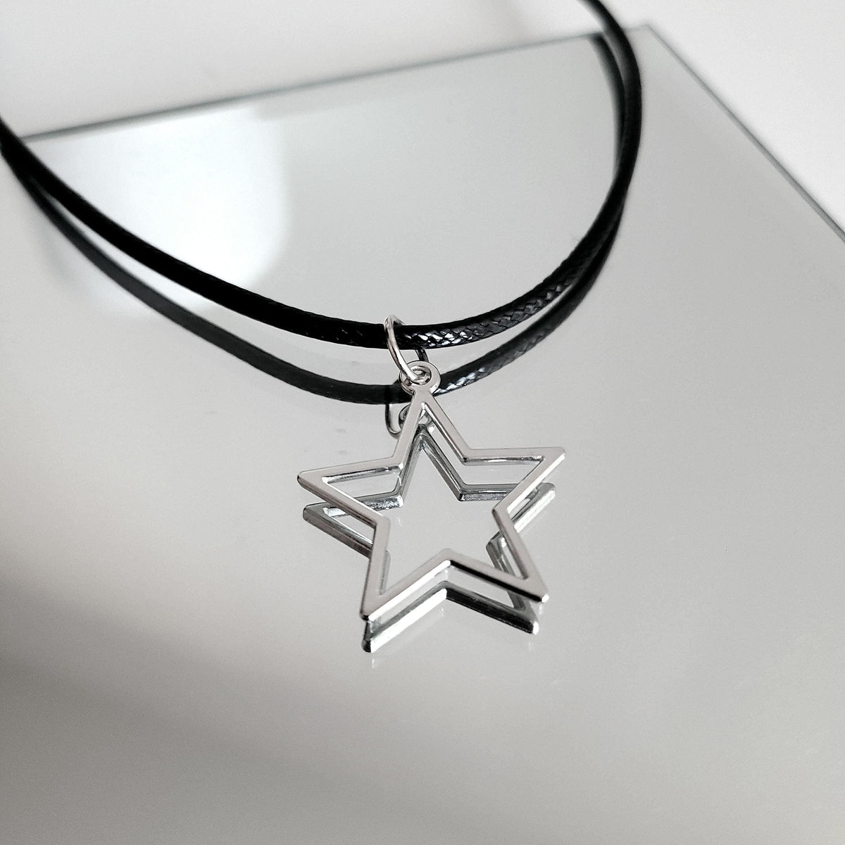 16" Silver Hollow Star Necklace - Black Cord