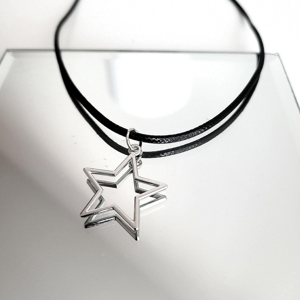 16" Silver Hollow Star Necklace - Black Cord